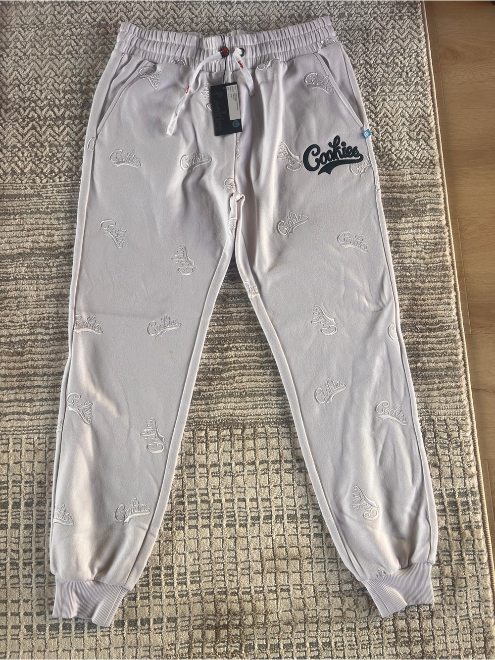 Cookies Embroidered Logo Sweatpants in white (L)
